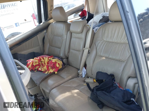 2010 Honda Odyssey Touring with VIN 5FNRL3H9XAB094765, listed as a IAAI auction lot 41892743 with 127,143 mi miles. Bid and sale history available at carsss.com. Image 8.