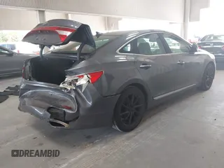2013 Hyundai Azera with VIN KMHFH4JG3DA213459, listed as a IAAI auction lot 42642239 with 130,195 mi miles and . Bid and sale history available at DreamBid. Image 4.