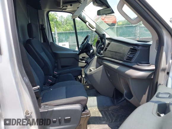 2021 Ford Transit z VIN 1FTYE1CG8MKA98319, wystawiony jako IAAI lot #42265312 z przebiegiem 85 302 mil mil oraz . Historia ofert i sprzedaży dostępna na DreamBid. Obrazek 5.