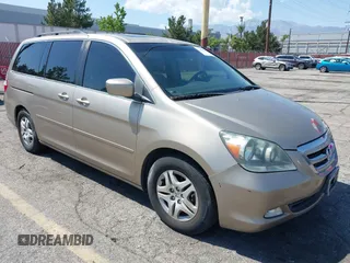 2006 Honda Odyssey EX-L with VIN 5FNRL38646B044795, listed as a IAAI auction lot 42102422 with 213,194 mi miles and . Bid and sale history available at carsss.com. Image 1.