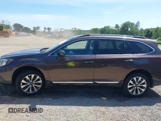 2019 Subaru Outback Touring with VIN 4S4BSATC7K3246765, listed as a IAAI auction lot 42793821 with 57,110 mi miles and . Bid and sale history available at DreamBid. Image 14.