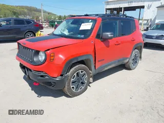 2016 Jeep Renegade Trailhawk z VIN ZACCJBCT1GPC81886, wystawiony jako IAAI lot #42102154 z przebiegiem 98 313 mil mil oraz . Historia ofert i sprzedaży dostępna na DreamBid. Obrazek 2.