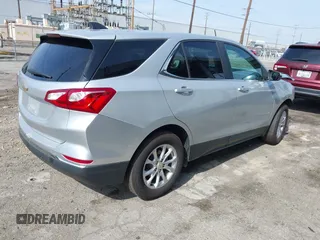 2021 Chevrolet Equinox LT z VIN 2GNAXKEV8M6103073, wystawiony jako IAAI lot #42111470 z przebiegiem 107 700 mil mil oraz . Historia ofert i sprzedaży dostępna na DreamBid. Obrazek 4.