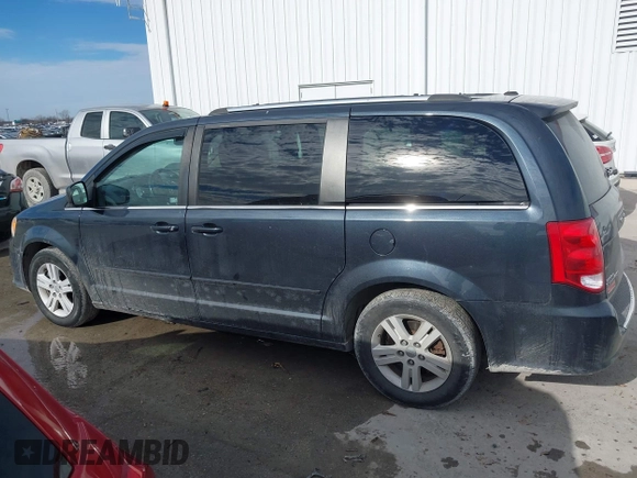 2013 Dodge Grand Caravan Crew with VIN 2C4RDGDG9DR740086, listed as a IAAI auction lot 41362852 with 145,881 mi miles and . Bid and sale history available at DreamBid. Image 13.