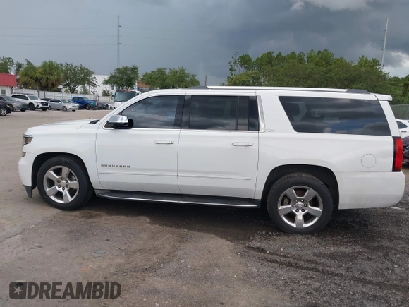 2015 Chevrolet Suburban LTZ with VIN 1GNSCKKC4FR239114, listed as a IAAI auction lot 42832146 with 183,711 mi miles and . Bid and sale history available at DreamBid. Image 14.