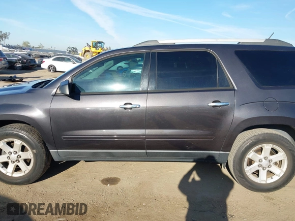 2014 GMC Acadia SLE with VIN 1GKKRNED0EJ359443, listed as a IAAI auction lot 41881129 with 100,998 mi miles and . Bid and sale history available at carsss.com. Image 14.