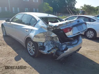 2014 Infiniti Q50 Premium with VIN JN1BV7AR4EM682593, listed as a IAAI auction lot 42581745 with 84,166 mi miles and . Bid and sale history available at DreamBid. Image 3.