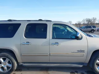 2012 Chevrolet Suburban LT with VIN 1GNSCJE07CR144215, listed as a IAAI auction lot 41924631 with 144,072 mi miles. Bid and sale history available at carsss.com. Image 13.