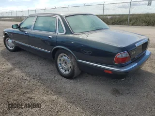 1999 Jaguar XJ with VIN SAJKX6047XC861227, listed as a Copart auction lot 75007414 with Not provided miles and Salvage title. Bid and sale history available at DreamBid. Image 2.