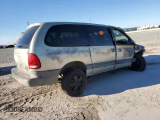 1999 Plymouth Voyager Grand SE z VIN 1P4GP44G1XB579504, wystawiony jako Copart lot #50064475 z przebiegiem Nie podano mil oraz Nie do naprawy. Historia ofert i sprzedaży dostępna na DreamBid. Obrazek 3.