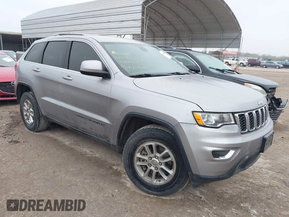 2018 Jeep Grand Cherokee Laredo E with VIN 1C4RJEAG8JC382825, listed as a IAAI auction lot 41288056 with 105,652 mi miles. Bid and sale history available at carsss.com. Image 1.