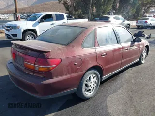 2002 Saturn LS z VIN 1G8JU54F72Y519923, wystawiony jako IAAI lot #40676524 z przebiegiem Nie podano mil oraz . Historia ofert i sprzedaży dostępna na DreamBid. Obrazek 4.