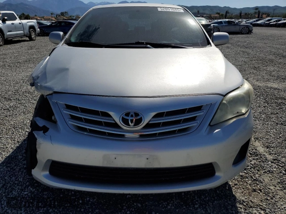 2013 Toyota Corolla L with VIN 5YFBU4EEXDP167695, listed as a Copart auction lot 52051685 with 192,427 mi miles and Salvage Title. Bid and sale history available at carsss.com. Image 5.
