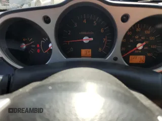 2004 Nissan 350Z Enthusiast z VIN JN1AZ36D34T110490, wystawiony jako Copart lot #57863915 z przebiegiem 139 757 mil mil oraz Szkody całkowita. Historia ofert i sprzedaży dostępna na DreamBid. Obrazek 9.
