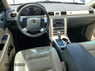 2008 Mercury Sable Premier z VIN 1MEHM42W38G607432, wystawiony jako Copart lot #54022165 z przebiegiem 118 959 mil mil oraz Szkody całkowita. Historia ofert i sprzedaży dostępna na DreamBid. Obrazek 8.