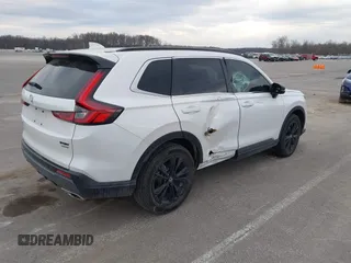 2025 Honda CR-V Sport Touring with VIN 7FARS6H9XSE043583, listed as a IAAI auction lot 41705098 with 6,020 mi miles and . Bid and sale history available at DreamBid. Image 4.