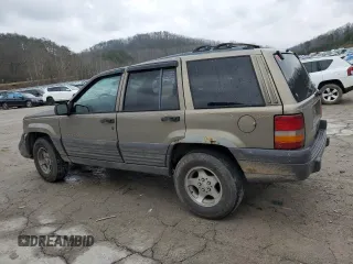 1996 Jeep Grand Cherokee Laredo with VIN 1J4GZ58Y5TC378100, listed as a Copart auction lot 85493724 with 0 mi miles and Salvage Title. Bid and sale history available at carsss.com. Image 2.