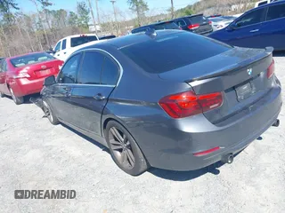 2013 BMW 3 Series ActiveHybrid 3 with VIN WBA3F9C50DF484095, listed as a IAAI auction lot 41780384 with 172,110 mi miles. Bid and sale history available at carsss.com. Image 3.