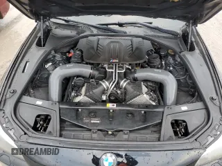 2014 BMW M5 z VIN WBSFV9C59ED097862, wystawiony jako Copart lot #85719684 z przebiegiem Nie podano mil oraz Szkody całkowita. Historia ofert i sprzedaży dostępna na DreamBid. Obrazek 14.