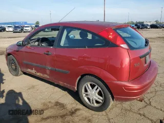 2003 Ford Focus ZX3 with VIN 3FAFP31313R133697, listed as a Copart auction lot 63413015 with 137,565 mi miles and Clean title. Bid and sale history available at DreamBid. Image 2.