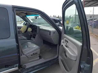 2003 GMC Sierra 1500 SLT with VIN 2GTEC19TX31404836, listed as a IAAI auction lot 42011067 with 233,458 mi miles and . Bid and sale history available at carsss.com. Image 5.