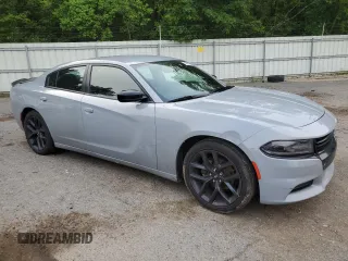 2021 Dodge Charger SXT with VIN 2C3CDXBG0MH534139, listed as a Copart auction lot 53963815 with 135,111 mi miles and Salvage Title. Bid and sale history available at DreamBid. Image 4.