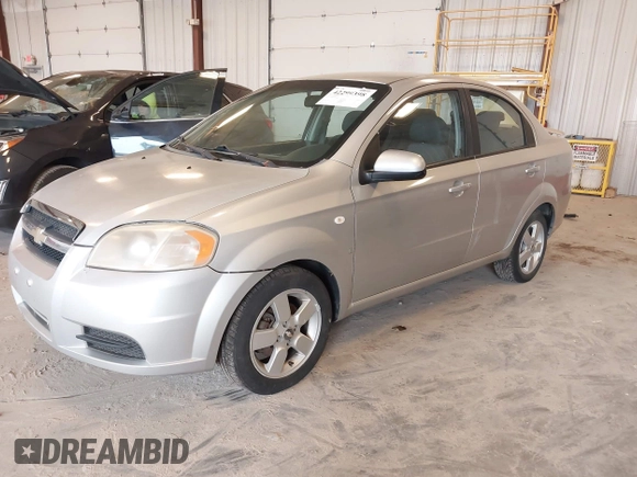 2008 Chevrolet Aveo LS with VIN KL1TD56618B064257, listed as a IAAI auction lot 42299398 with 158,877 mi miles and . Bid and sale history available at DreamBid. Image 2.