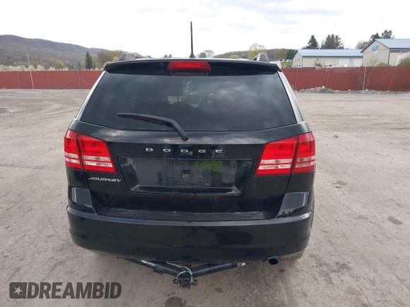 2018 Dodge Journey SE with VIN 3C4PDCAB1JT446005, listed as a IAAI auction lot 42001854 with 70,074 mi miles and . Bid and sale history available at DreamBid. Image 17.