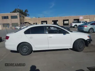 2012 Volkswagen Jetta Sedan S w/Sunroof with VIN 3VW2K7AJXCM355596, listed as a IAAI auction lot 41642491 with 130,937 mi miles. Bid and sale history available at carsss.com. Image 14.