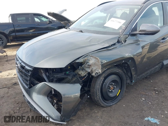2022 Hyundai Tucson SEL with VIN 5NMJBCAEXNH031855, listed as a IAAI auction lot 41677386 with 40,606 mi miles and . Bid and sale history available at DreamBid. Image 6.
