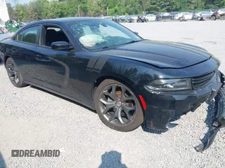 2015 Dodge Charger SXT with VIN 2C3CDXHG5FH863218, listed as a IAAI auction lot 42403952 with 105,307 mi miles and . Bid and sale history available at DreamBid. Image 1.