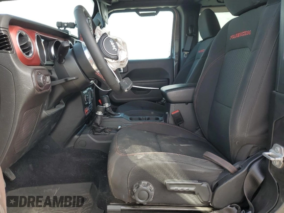 2023 Jeep Wrangler Rubicon with VIN 1C4HJXCG5PW652704, listed as a Copart auction lot 59762475 with 19,924 mi miles and Salvage title. Bid and sale history available at DreamBid. Image 7.