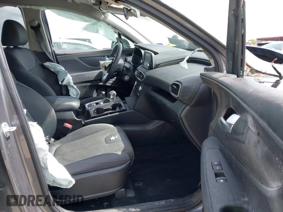 2019 Hyundai Santa Fe SE with VIN 5NMS23AD2KH108936, listed as a IAAI auction lot 42626196 with 72,757 mi miles and . Bid and sale history available at DreamBid. Image 5.