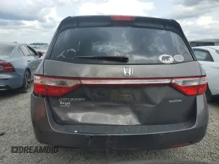 2012 Honda Odyssey Touring with VIN 5FNRL5H94CB102177, listed as a Copart auction lot 55942185 with 179,418 mi miles and Salvage Title. Bid and sale history available at DreamBid. Image 6.