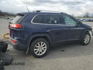 2016 Jeep Cherokee Limited with VIN 1C4PJMDB3GW261581, listed as a Copart auction lot 52699135 with 162,510 mi miles and Salvage Title. Bid and sale history available at DreamBid. Image 3.