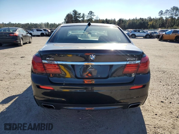 2015 BMW 7 Series 750i xDrive with VIN WBAYB6C57FD965993, listed as a Copart auction lot 83871924 with 76,720 mi miles and Salvage Title. Bid and sale history available at carsss.com. Image 6.
