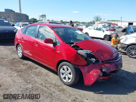 2007 Toyota Prius z VIN JTDKB20U577558459, wystawiony jako IAAI lot #42265933 z przebiegiem 104 286 mil mil oraz . Historia ofert i sprzedaży dostępna na DreamBid. Obrazek 1.