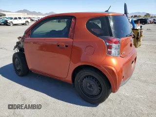 2013 Scion iQ z VIN JTNJJXB01DJ022124, wystawiony jako Copart lot #47960265 z przebiegiem 95 551 mil mil oraz Szkoda całkowita • Salvage title. Historia ofert i sprzedaży dostępna na DreamBid. Obrazek 2.