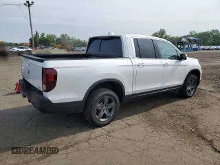 2023 Honda Ridgeline RTL with VIN 5FPYK3F53PB067003, listed as a Copart auction lot 58384895 with 31,983 mi miles and Salvage title. Bid and sale history available at DreamBid. Image 3.