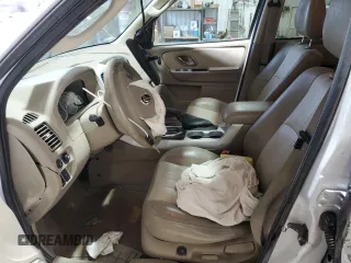 2005 Mercury Mariner Luxury z VIN 4M2CU57145DJ11612, wystawiony jako Copart lot #43980985 z przebiegiem 102 859 mil mil oraz Szkody całkowita. Historia ofert i sprzedaży dostępna na DreamBid. Obrazek 7.
