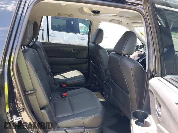 2019 Honda Pilot Touring 7-Passenger with VIN 5FNYF6H67KB031988, listed as a IAAI auction lot 42519588 with 41,368 mi miles and . Bid and sale history available at DreamBid. Image 8.