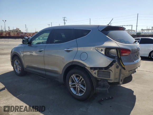 2018 Hyundai Santa Fe 2.4L with VIN 5NMZT3LB2JH076298, listed as a Copart auction lot 63461435 with 79,881 mi miles and Salvage title. Bid and sale history available at DreamBid. Image 2.
