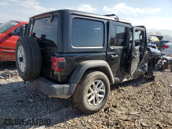 2023 Jeep Wrangler Sport Altitude with VIN 1C4HJXDN9PW634199, listed as a Copart auction lot 65940434 with Not Provided miles and Salvage Title. Bid and sale history available at DreamBid. Image 3.