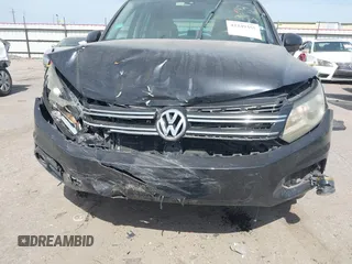 2012 Volkswagen Tiguan SE with VIN WVGAV7AX6CW521960, listed as a IAAI auction lot 42249355 with 118,496 mi miles and . Bid and sale history available at DreamBid. Image 12.