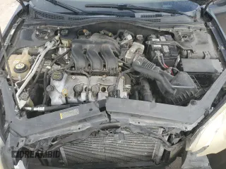 2008 Mercury Milan Premier z VIN 3MEHM08148R627458, wystawiony jako Copart lot #43215655 z przebiegiem 222 109 mil mil oraz Szkoda całkowita • Salvage title. Historia ofert i sprzedaży dostępna na DreamBid. Obrazek 12.