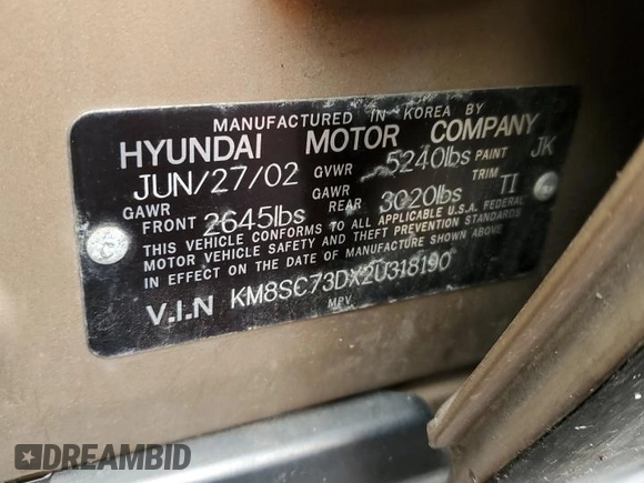 2002 Hyundai Santa Fe GLS with VIN KM8SC73DX2U318190, listed as a Copart auction lot 64256634 with 123,993 mi miles and Non Repairable. Bid and sale history available at carsss.com. Image 12.