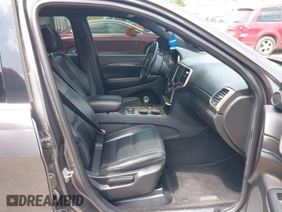 2014 Jeep Grand Cherokee Limited z VIN 1C4RJFBG5EC431229, wystawiony jako IAAI lot #42436481 z przebiegiem 102 442 mil mil oraz . Historia ofert i sprzedaży dostępna na DreamBid. Obrazek 5.