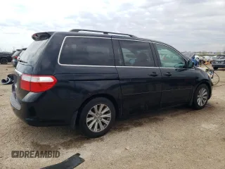 2007 Honda Odyssey Touring with VIN 5FNRL38847B022928, listed as a Copart auction lot 53869135 with 217,620 mi miles and Salvage Title. Bid and sale history available at DreamBid. Image 3.