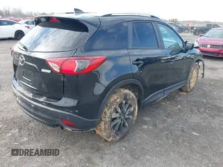 2016 Mazda CX-5 Touring with VIN JM3KE4CY7G0602267, listed as a IAAI auction lot 41854213 with 134,170 mi miles and . Bid and sale history available at carsss.com. Image 4.