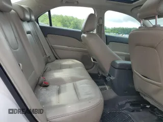2010 Ford Fusion Hybrid with VIN 3FADP0L36AR203663, listed as a Copart auction lot 60310095 with 211,922 mi miles and Salvage title. Bid and sale history available at DreamBid. Image 10.
